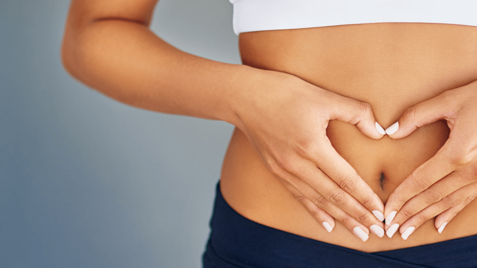 woman touching her stomach